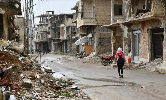 Children walk through a neighbourhood in Zabadani, rural Damascus, in Syria.
